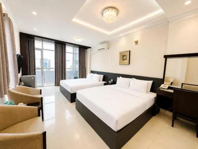 King Room with Two King Beds — Calmette Hotel 151 - Ben Thanh
